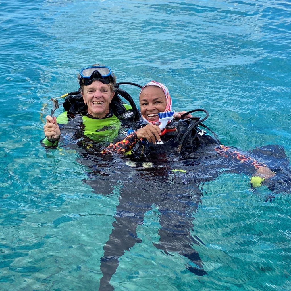 certified coral reef volunteers loretta and susie on a coral restoration dive at buddys reef